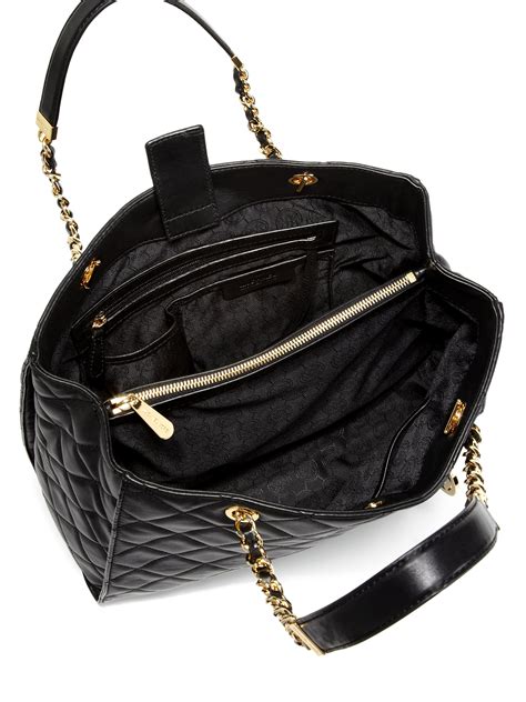 michael kors black tote bag|michael kors black quilted handbags.